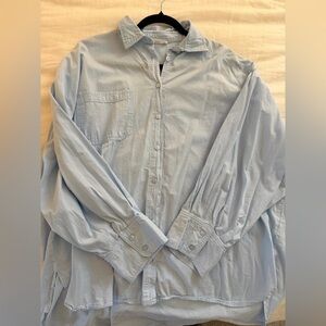 Women's light blue oversized button up blouse